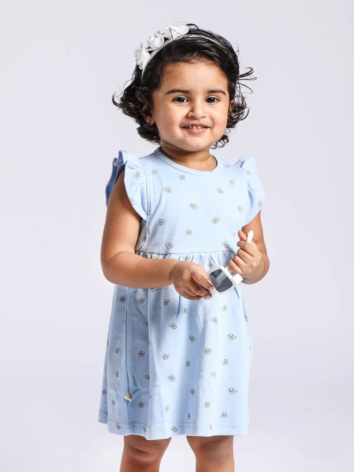 Sleeveless blue frock for baby girls