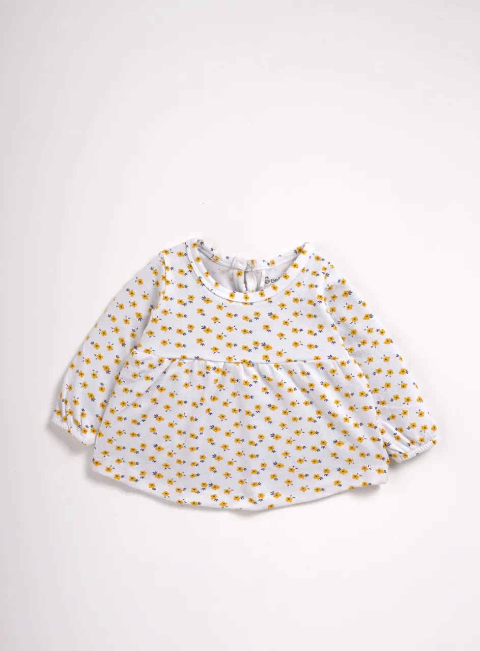 Full sleeve yellow flower pattern in white frock for baby girls