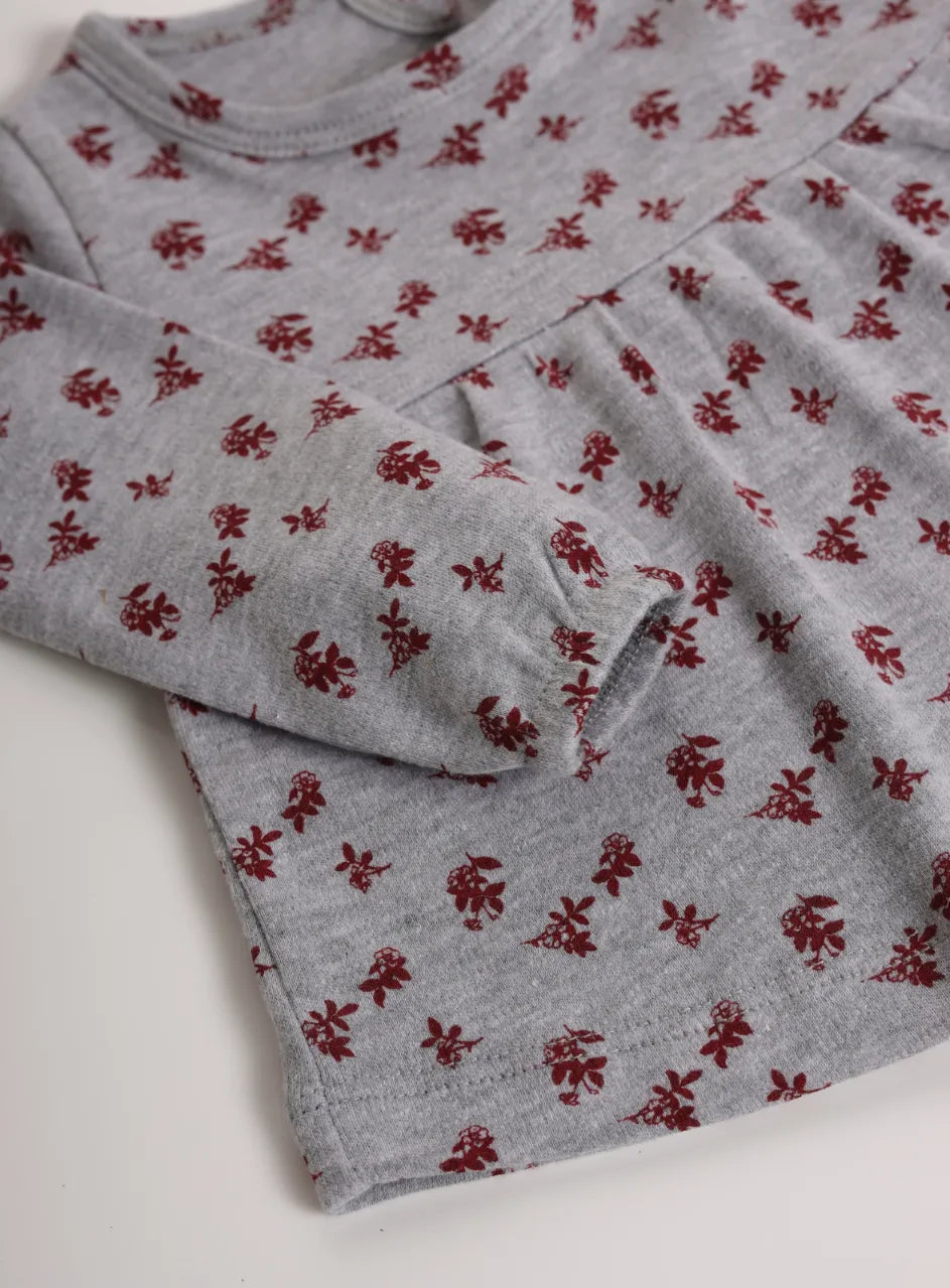 Full sleeve red flower pattern in white frock for baby girls